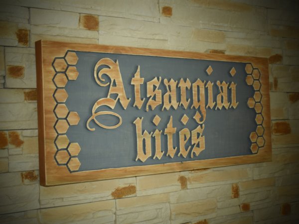 Wooden, handmade signboard "Atsargiai bitės" ("Be careful bees").  2
