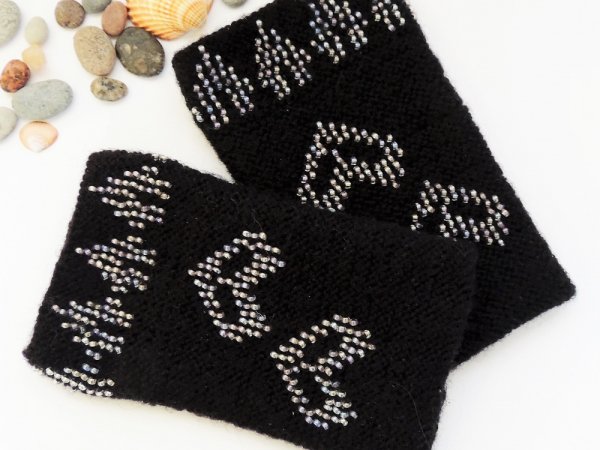 Hand-knitted black wristbands with beads. 3