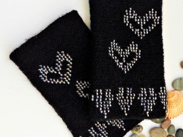 Hand-knitted black wristbands with beads. 2
