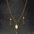 Brass chain and carved amber - Metal products - making